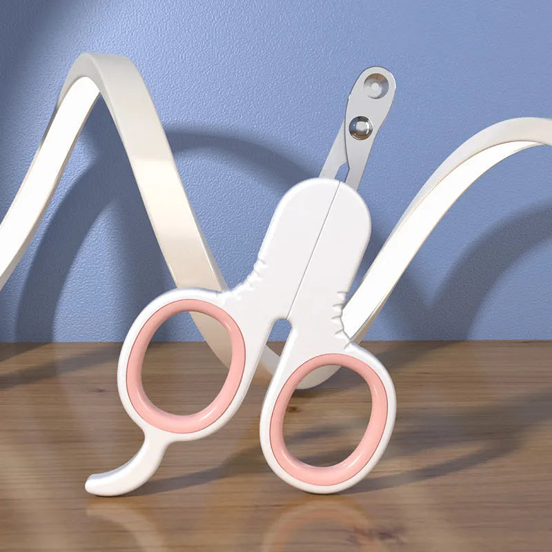 Professional grey pet nail clippers with curved safety tips and a rubberised ergonomic handle on a white background.