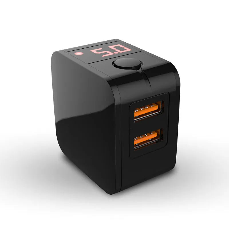 Black dual USB fast charger with digital voltage display showing 5V output and foldable UK plug