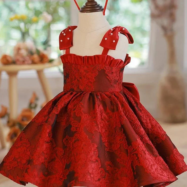 Red princess-style braces skirt for girls with adjustable straps on hanger