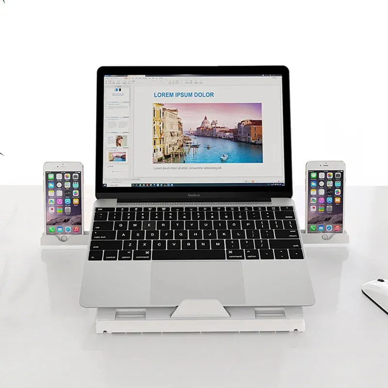 Foldable aluminium laptop stand in black or white, 280 x 280 x 25.5mm, with 9 adjustable angles and cooling slot.