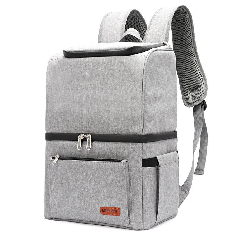 Blue insulated cooler backpack with shoulder straps and top handle