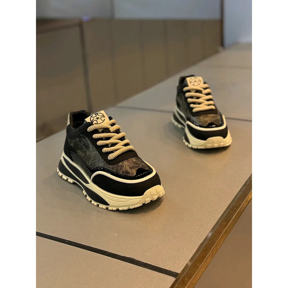 Men's black thick-sole retro lace-up casual shoes on a white background.