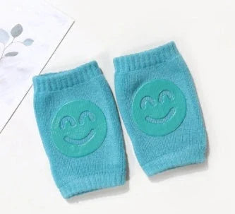 Cozy knee pads in various colors designed to protect babies during crawling with a non-slip, stretchy fit
