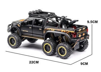 Realistic 1:28 scale Ford Raptor toy car with alloy body, lights, sounds, and pull-back action feature