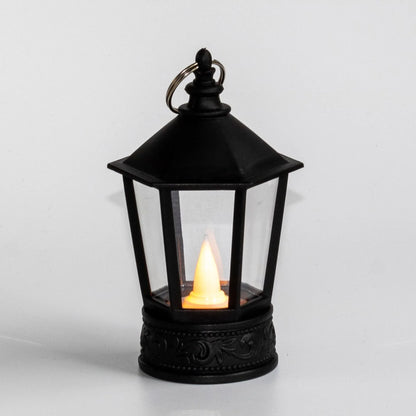 Festive LED Christmas lanterns with Santa Claus, snowman, and other holiday-themed designs