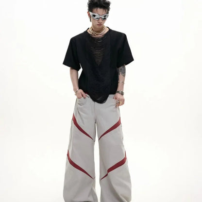 Men's loose fit black t-shirt with a hollow-out V-neck collar and tassel detail on short sleeves.