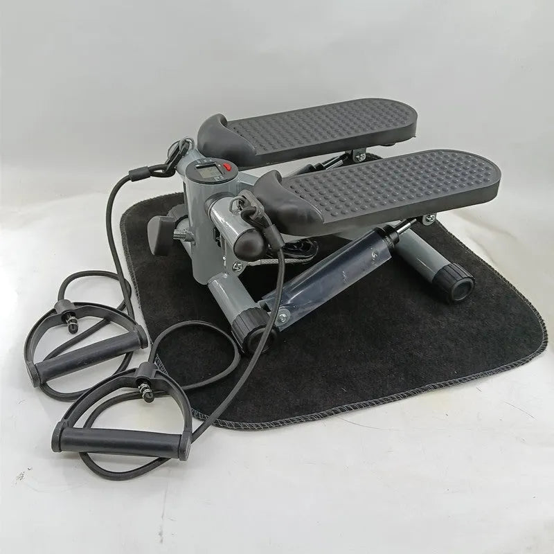 Silver grey hydraulic mini treadmill with stepping pedals for home waist slimming exercises