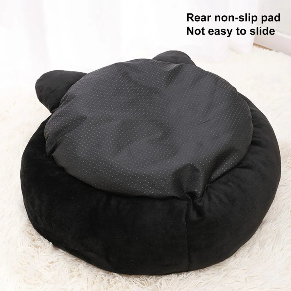 Black cat-shaped velvet pet nest bed with raised edges showing S and M size options