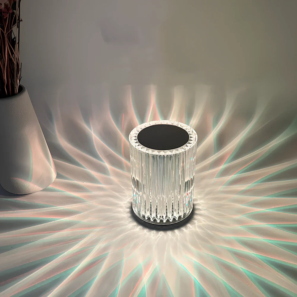 Crystal lamp with acrylic lines showing RGB lighting options on 9cm by 13cm base