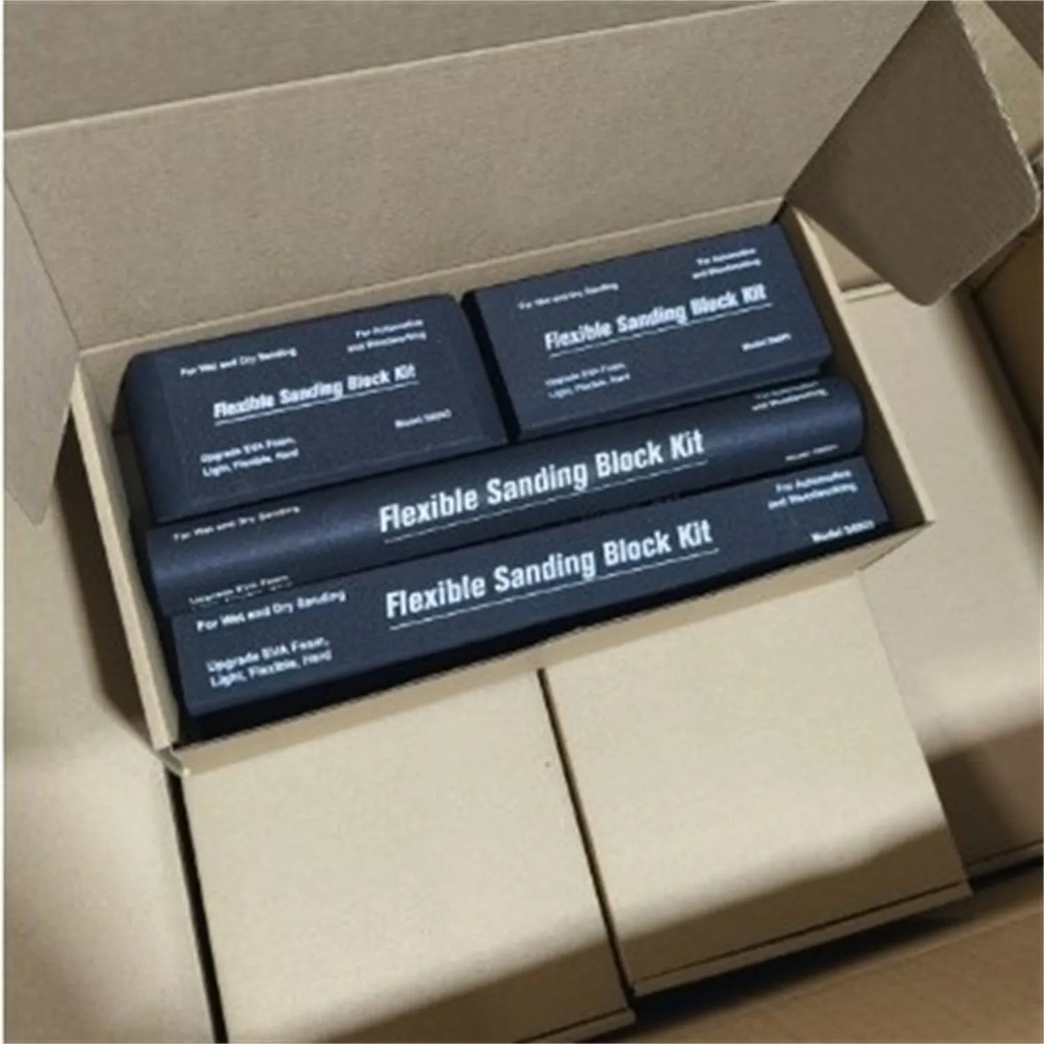 Seven black frosted metal EVA blocks arranged together, each measuring 20mm by 20mm by 10mm.