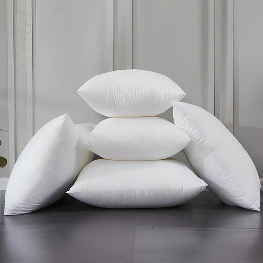 White cotton throw pillow with detachable cover in 18-inch square size with weather-resistant properties