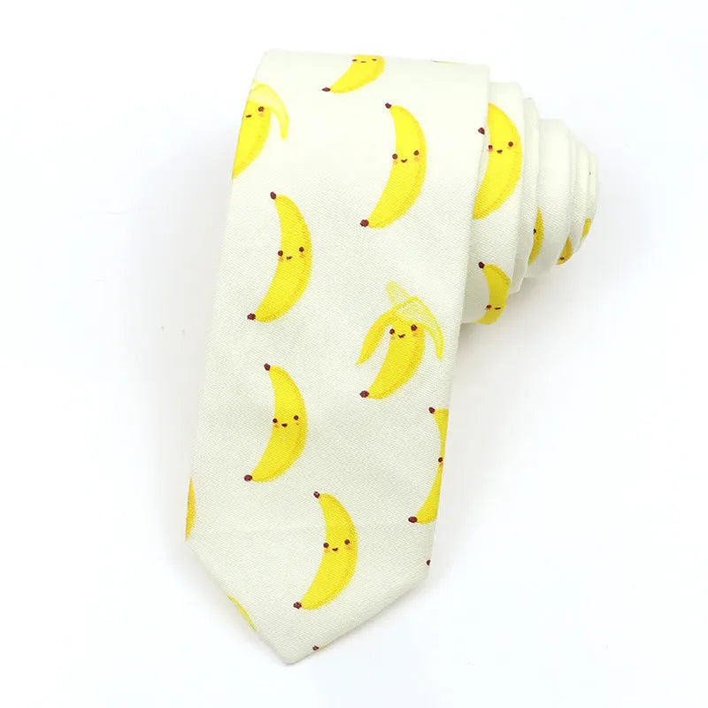 A narrow Korean-style cotton bow tie featuring a cartoon print, shown in a selection of colours.
