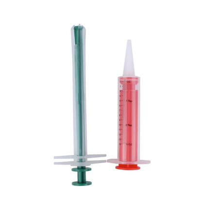 Two silicone pet pill shooters with soft tips for cat and dog medication.