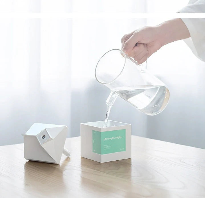 White milk carton shaped USB humidifier with 260ml capacity measuring 75mm x 75mm x 113mm