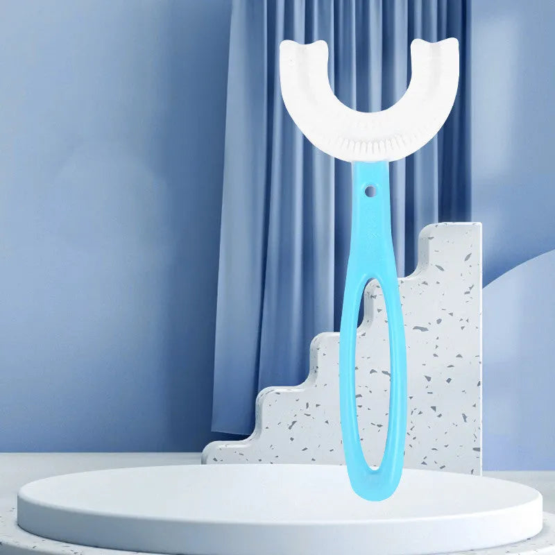 Children's U-shaped soft rubber toothbrush in pink and blue colours.