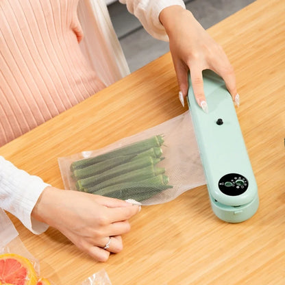 Green compact vacuum sealing machine, 32x7.5x5cm size, 110W power for food preservation with -50kPa pressure