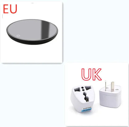 Black coffee mug warmer pad with temperature switch on desk
