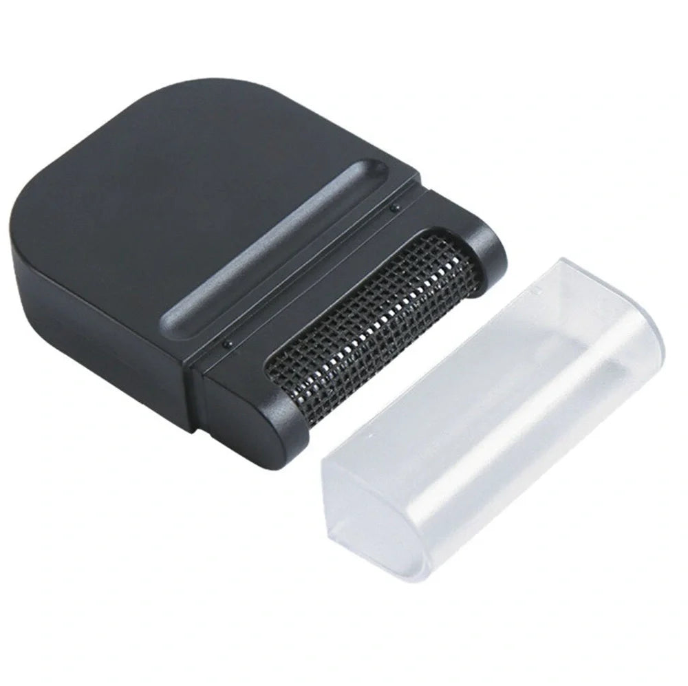 Portable manual fabric cleaning brush with removable catching net, 6.4 cm wide plastic construction