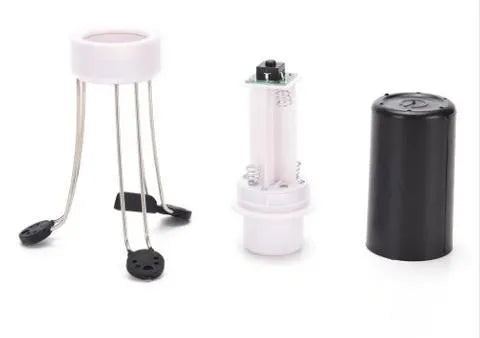White and black wireless automatic kitchen stirrer with three-speed button, shown next to a saucepan.