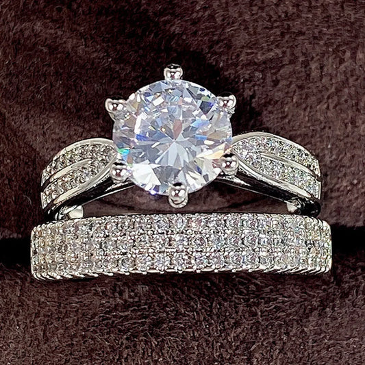 White gold colour combined ring bracelet with geometric design and round elements, showing size options 5-11