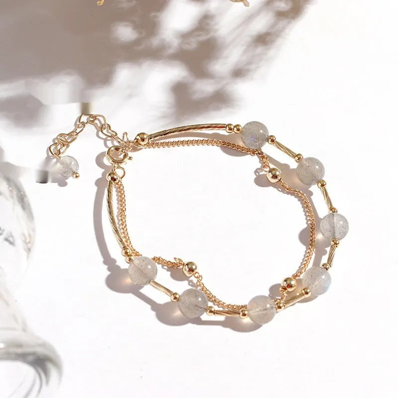 Women's electroplated crystal bracelet with moonstone charm and double copper tube design