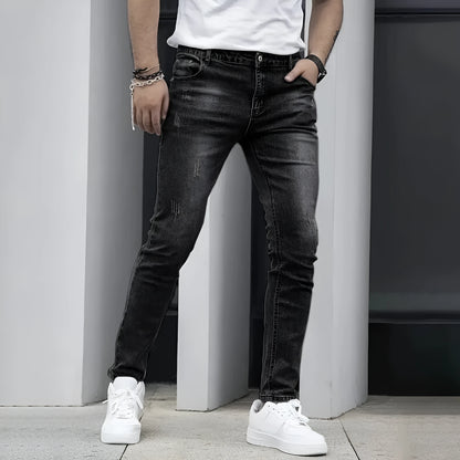 Men's black stretch jeans with straight leg skinny fit showing zipper fly and mid-rise waist