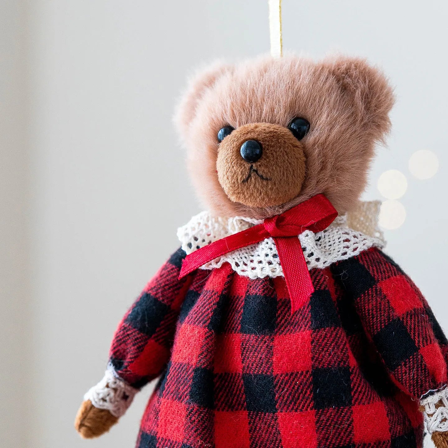 A cartoon-style plush bear doll in a cloth suit plaid design, shown in gentleman bear and princess bear variants.