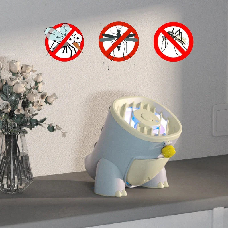 Dinosaur Mosquito Killing Lamp in pink, green, and blue options on a white background
