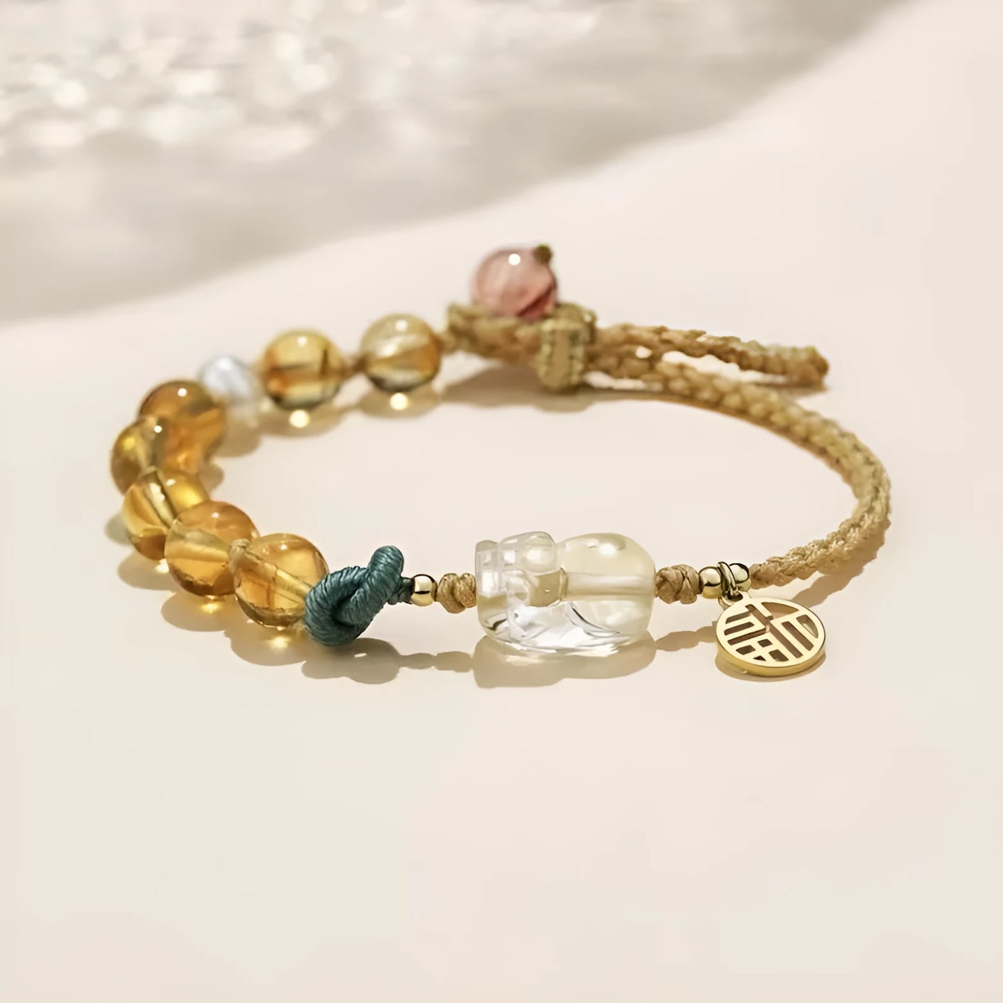 Hand-woven citrine crystal bracelet with animal zodiac designs in natural unisex style