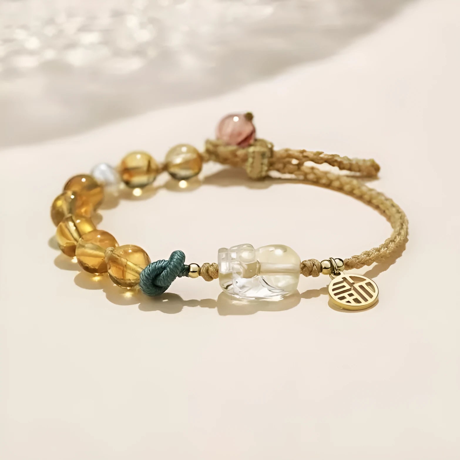 Hand-woven citrine crystal bracelet with animal zodiac designs in natural unisex style