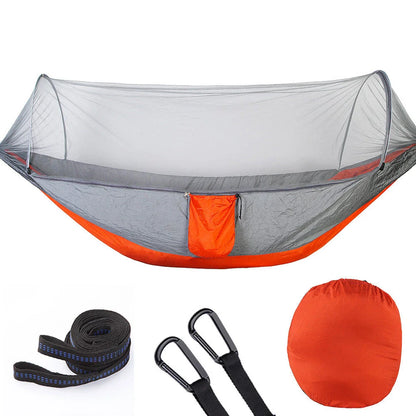 Cozy outdoor hammock with mosquito net for relaxing in nature and outdoor adventures