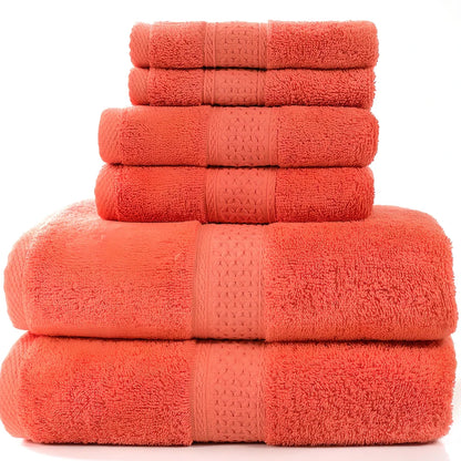 Cotton towel set showing bath towel, hand towel, and face cloth in coordinated sizes