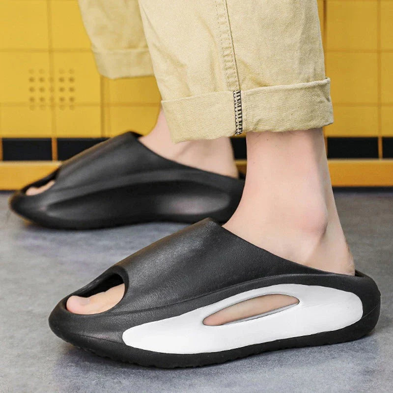 Stylish and comfortable unisex slippers with a unique hollow design, perfect for summer beach and casual wear