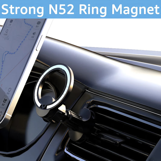 Black magnetic car phone holder clipped onto a car air vent, showing O-ring magnet and silicone grips.