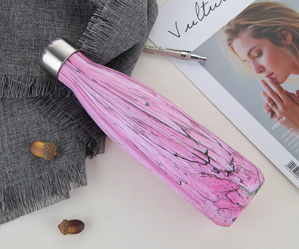 Stainless steel thermal water bottle with 500ml capacity and vacuum insulation technology