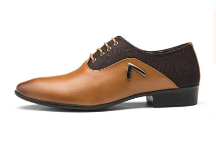 Men's black Oxford shoes with a polished PU upper and durable rubber sole on a wooden floor.
