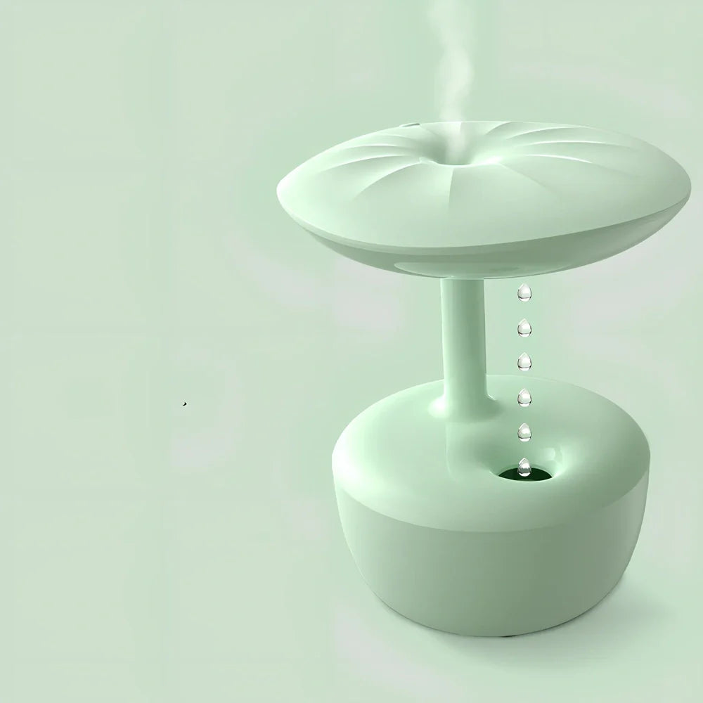 White lotus leaf shaped USB humidifier with mist output and LED illumination on wooden surface