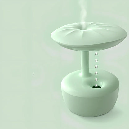 White lotus leaf shaped USB humidifier with mist output and LED illumination on wooden surface