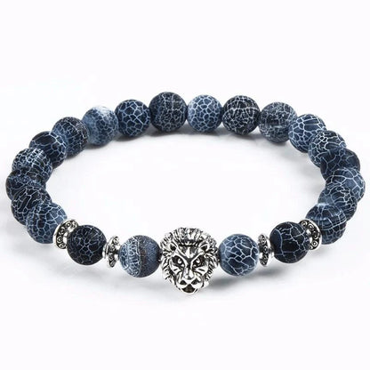 Carved stone bracelet featuring a powerful lion design, meant to enhance confidence and style.