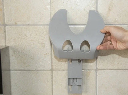Wall-mounted kitchen organizer with double-layer storage and hooks for utensils
