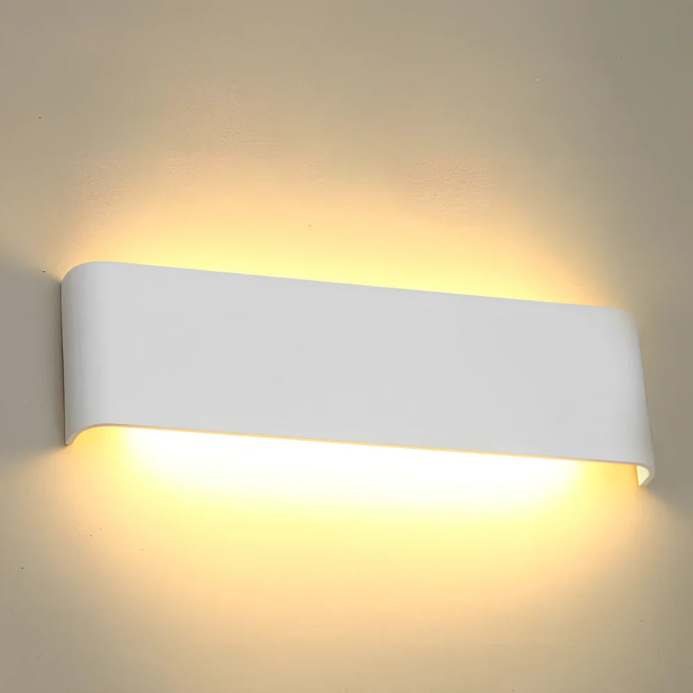 Slim 310mm wall light with aluminium alloy construction and 3000K warm LED illumination