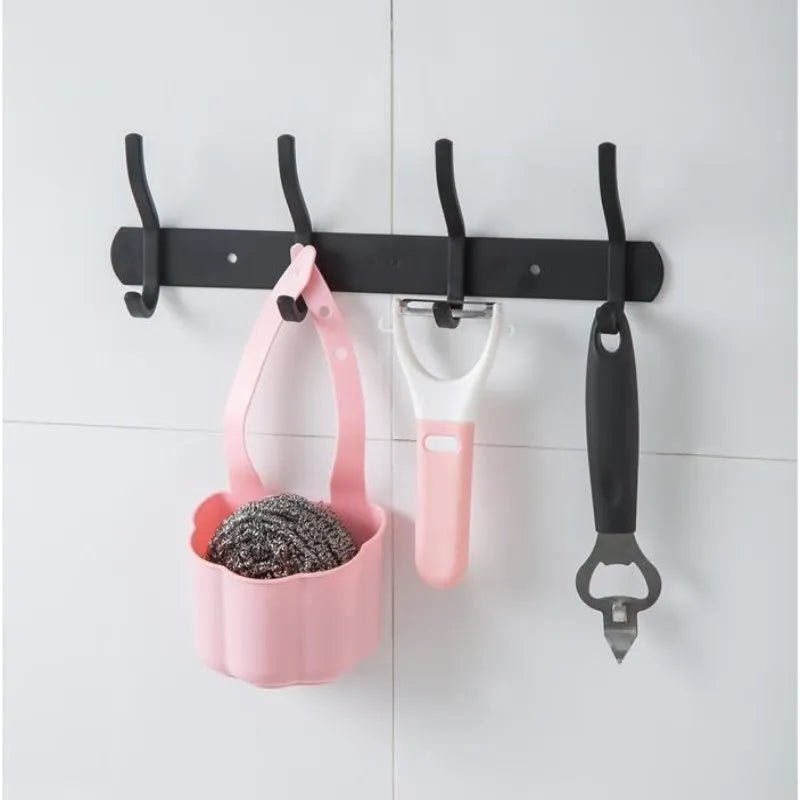 Nordic style plastic sink drain basket with draining compartment in blue, grey, or pink colour options.