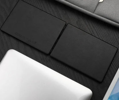 Black wireless mini Bluetooth folding keyboard with PU leather case, 12mm slim body, 6.2oz, scissor-switch keys, 166-degree angle