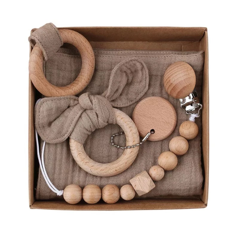 Natural cotton baby bath toy set with wooden rattle and comfort towel