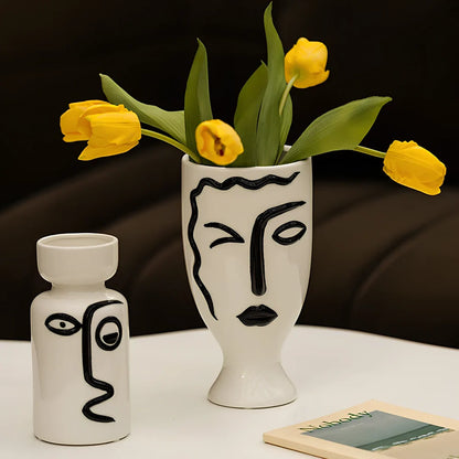 Ceramic vase with hand-painted surface in modern minimalist design, shown in large and small size variations