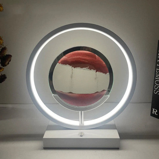 Creative minimalist quicksand table lamp with adjustable three-colour LED lighting on wooden surface