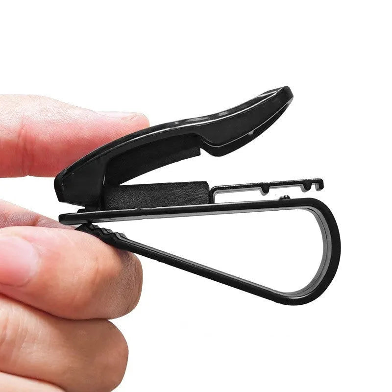 Black plastic car sun visor clip for glasses, tickets, and ID cards measuring 6.5cm long