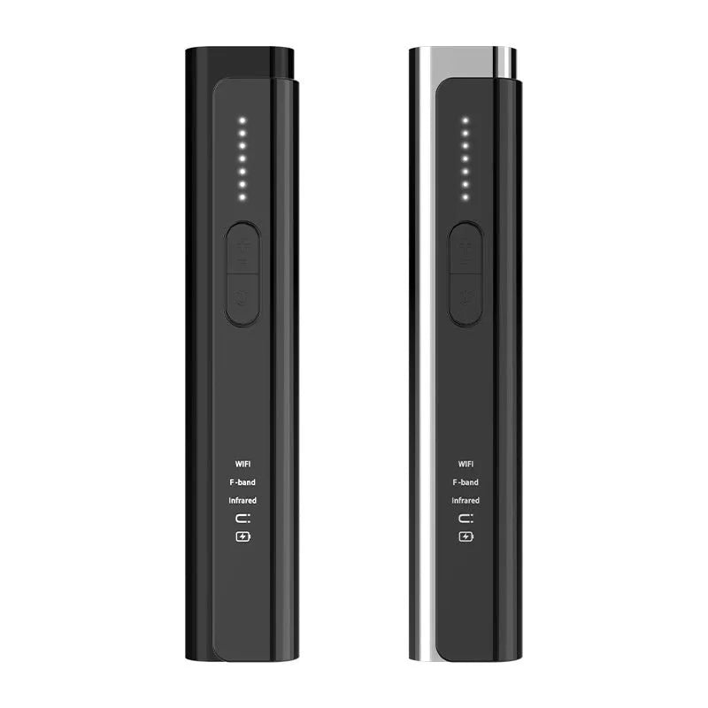 Black and silver handheld Signal Search anti spy camera detector on a plain background.