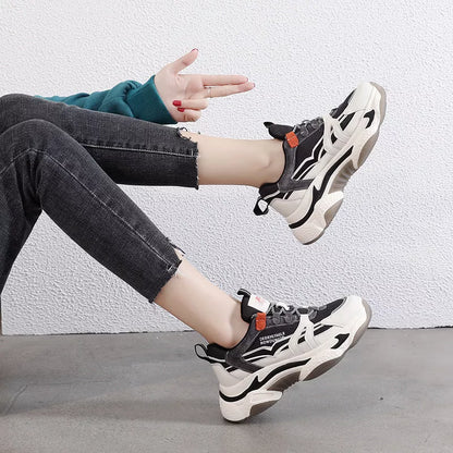 Thick-soled casual sports shoes in green and orange with leather and mesh upper