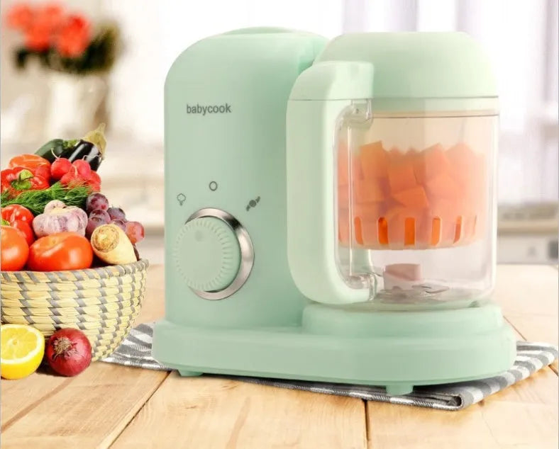 Baby food processor with steamer and blender functions in green colour